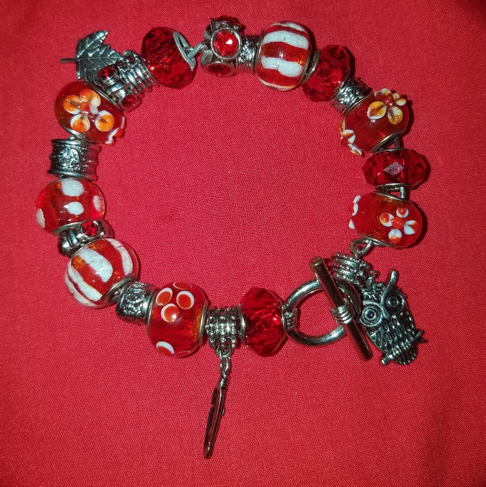A red murano charm bracelet